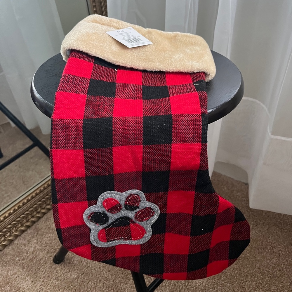 Christmas stocking, red and black, paw print, tan fur at top